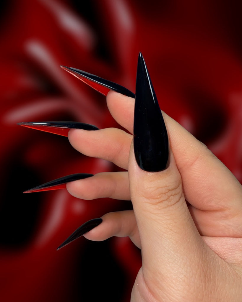 Piano Black: Red Bottoms- Pamper Nail Gallery- glossy black with classic red-bottom inspired by shoes made by Christian Louboutin